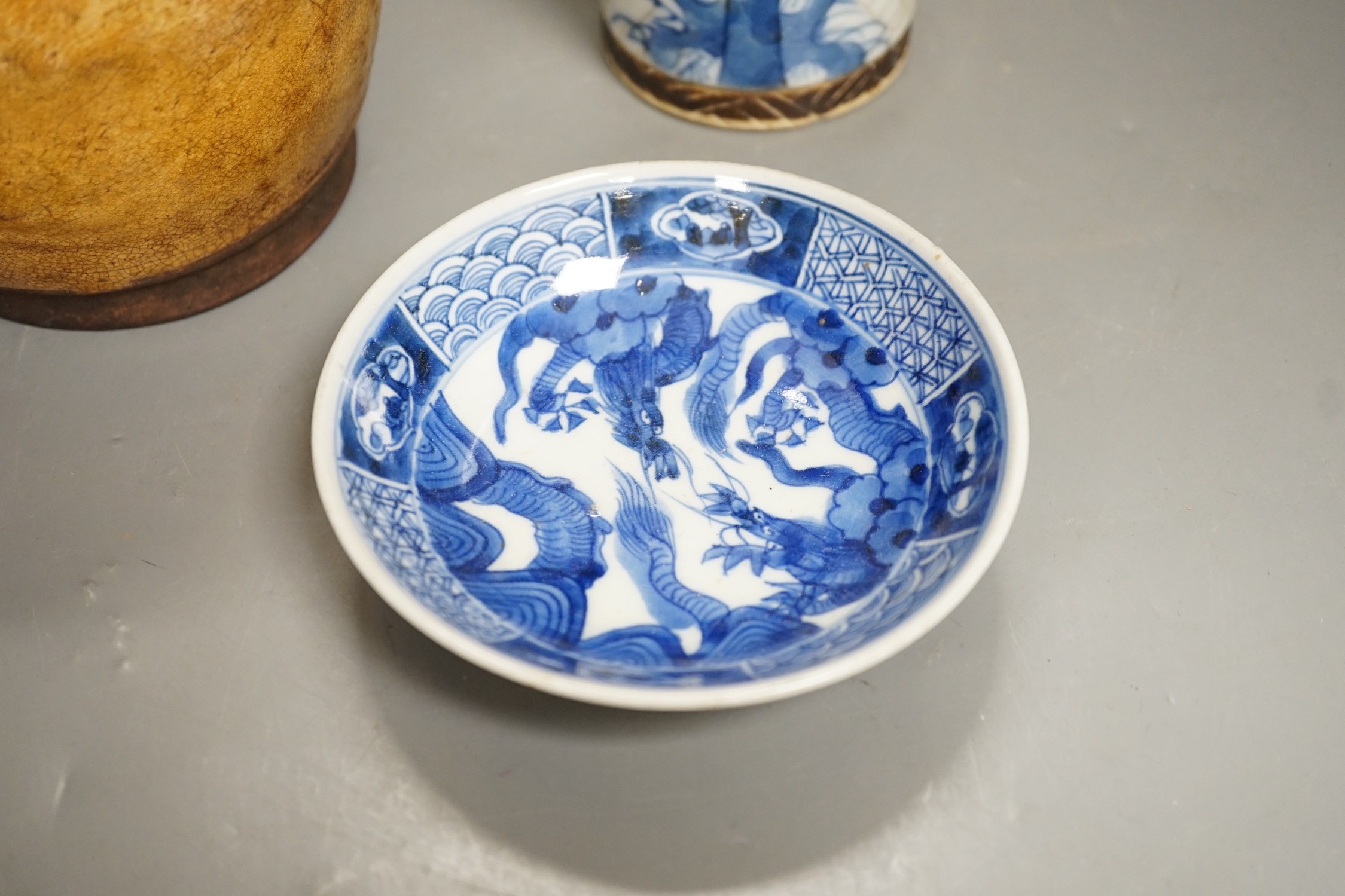 A Chinese crackle glaze blue and white sleeve vase, 20cm high, similar dish and pottery vessel